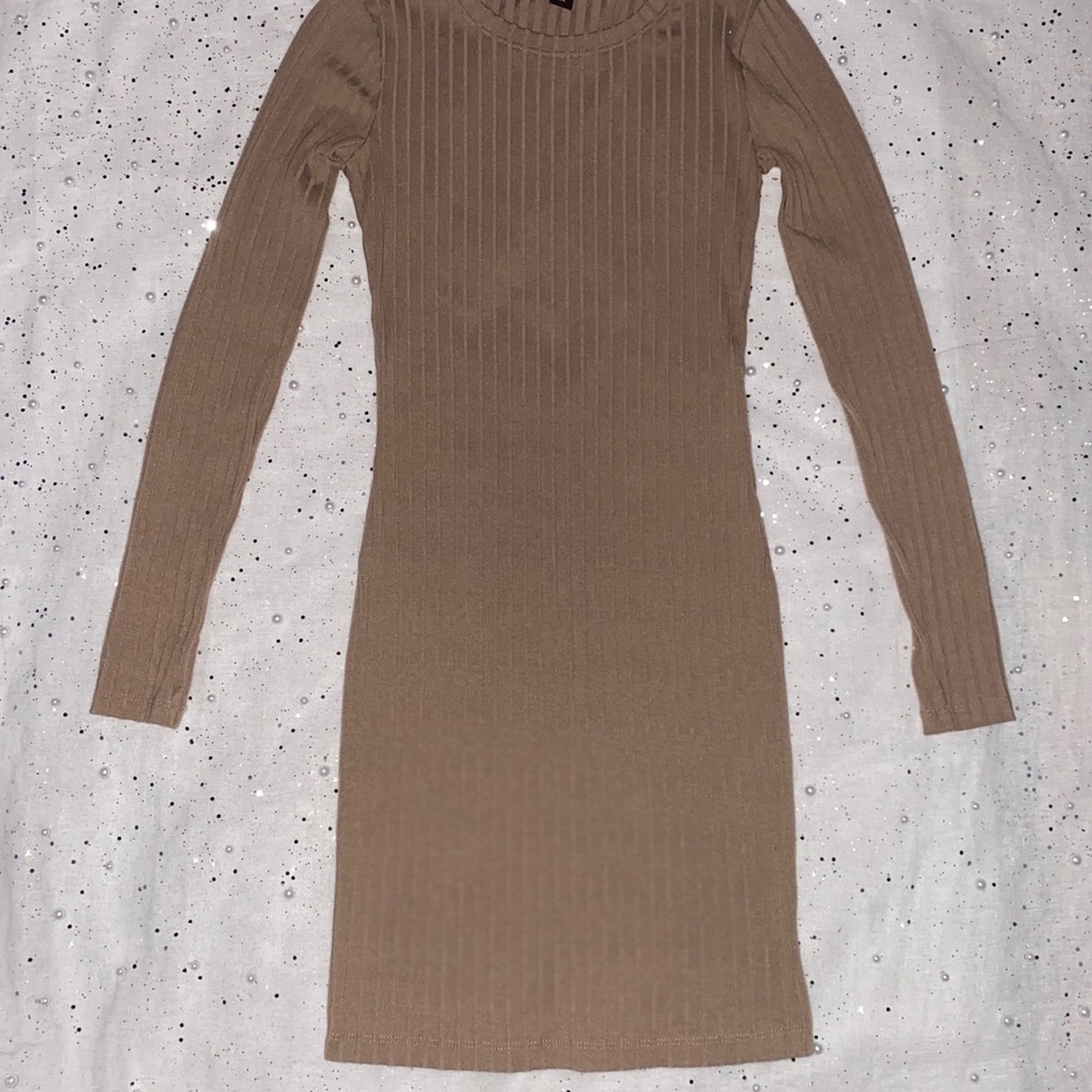 Long sleeved Open back short length mini dress